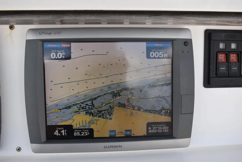 Harry's Dream Yacht Photos Pics Garmin GPS display on 2005 Fountain 38 Sportfish CC Tournament boat, showing navigation map and data.