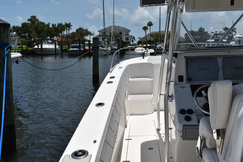 Harry's Dream Yacht Photos Pics 2005 Fountain 38 Sportfish CC Tournament boat docked in a marina, featuring a sleek white deck.