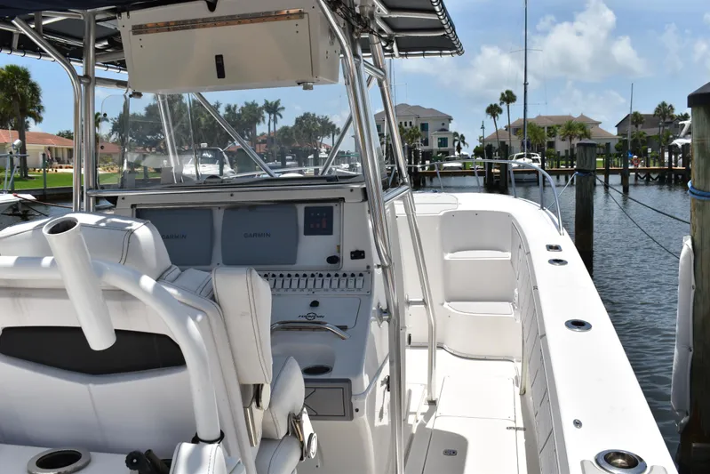 Harry's Dream Yacht Photos Pics 2005 Fountain 38 Sportfish CC Tournament boat docked, featuring sleek design and advanced navigation equipment.