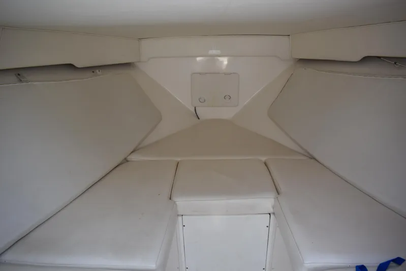 Harry's Dream Yacht Photos Pics Interior cabin of 2005 Fountain 38 Sportfish CC Tournament boat, featuring cushioned seating.