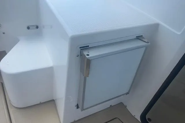 R & R Yacht Photos Pics 2019 Ranger Tugs R-31-S boat interior detail with storage compartment.