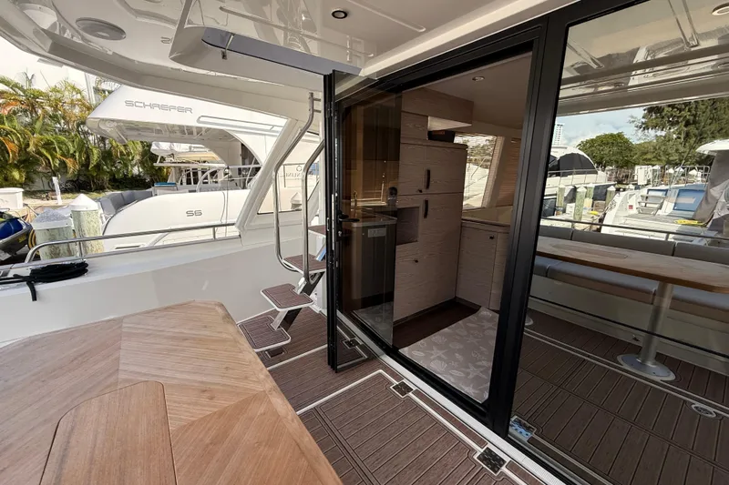 Electric Summer Yacht Photos Pics 2024 Greenline 48 Fly Hybrid yacht interior with modern design and wooden flooring.
