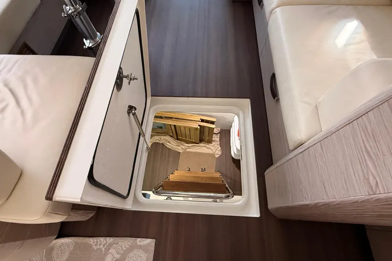 Electric Summer Yacht Photos Pics Interior of 2024 Greenline 48 Fly Hybrid yacht showing access hatch and seating area.