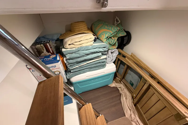 Electric Summer Yacht Photos Pics Storage area in 2024 Greenline 48 Fly Hybrid with towels, cooler, and supplies.