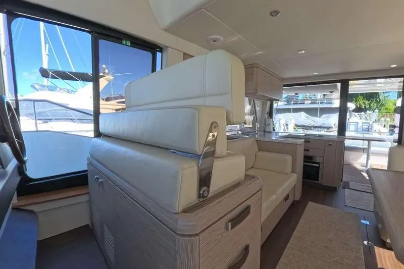 Electric Summer Yacht Photos Pics Interior of 2024 Greenline 48 Fly Hybrid yacht, featuring modern seating and sleek design.