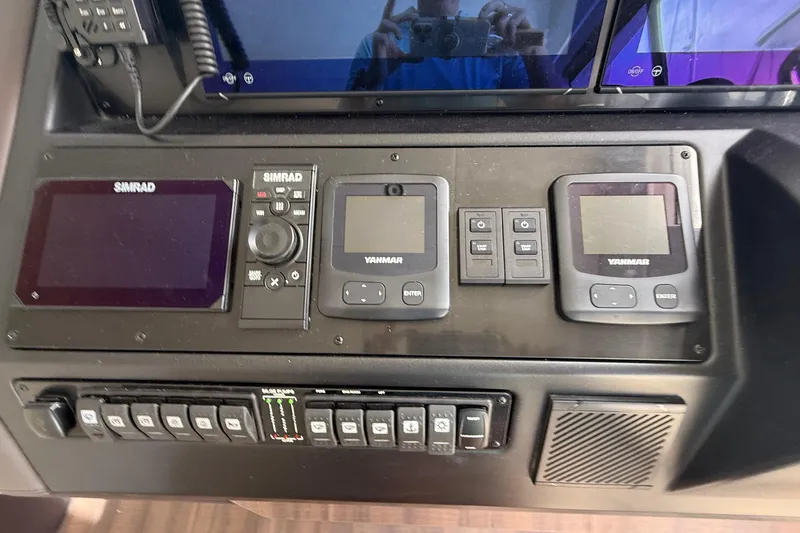 Electric Summer Yacht Photos Pics Control panel of 2024 Greenline 48 Fly Hybrid with Simrad and Yanmar displays.