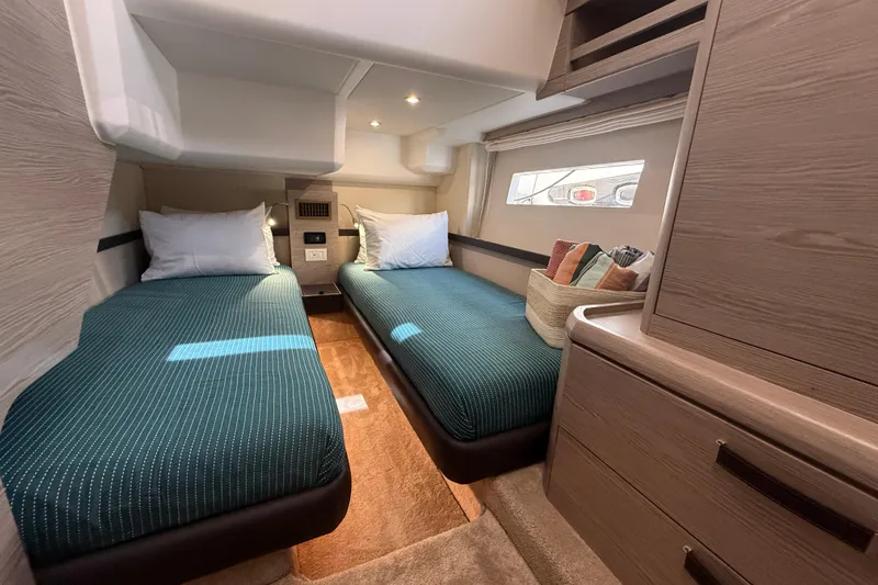 Electric Summer Yacht Photos Pics Interior of 2024 Greenline 48 Fly Hybrid yacht with twin beds and modern decor.
