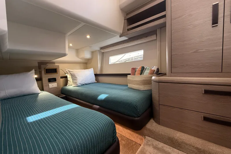 Electric Summer Yacht Photos Pics Luxurious cabin interior of 2024 Greenline 48 Fly Hybrid yacht with twin beds.