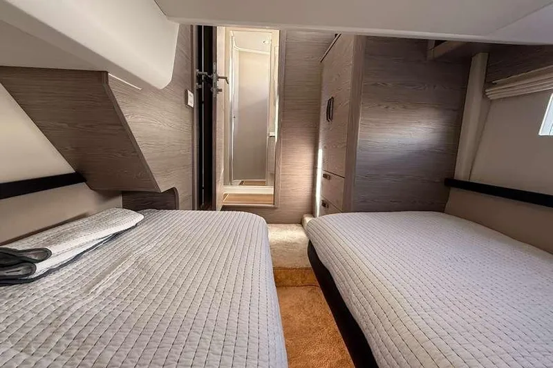 Electric Summer Yacht Photos Pics Interior of 2024 Greenline 48 Fly Hybrid yacht with twin beds and modern design.