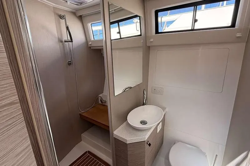 Electric Summer Yacht Photos Pics Modern bathroom interior of 2024 Greenline 48 Fly Hybrid yacht, featuring shower and sink.