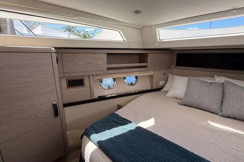 Electric Summer Yacht Photos Pics Luxurious cabin interior of 2024 Greenline 48 Fly Hybrid yacht with modern furnishings.