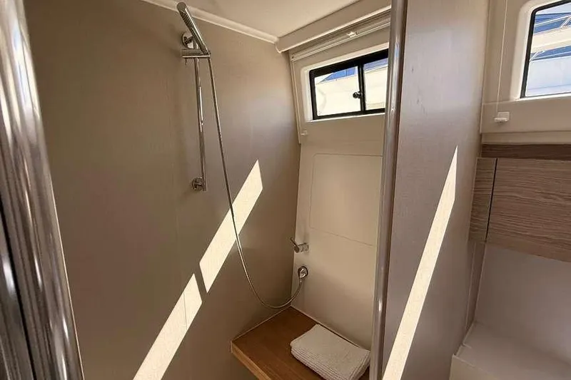 Electric Summer Yacht Photos Pics 2024 Greenline 48 Fly Hybrid yacht bathroom with modern shower and window.