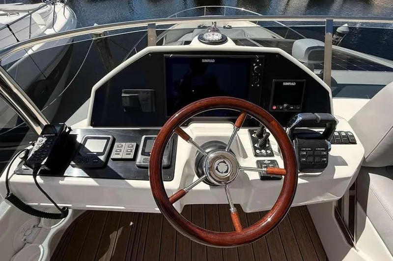Electric Summer Yacht Photos Pics Helm of 2024 Greenline 48 Fly Hybrid yacht with advanced navigation controls.