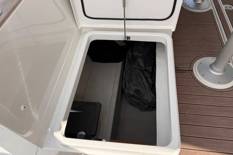 Electric Summer Yacht Photos Pics Open storage compartment on 2024 Greenline 48 Fly Hybrid yacht deck.