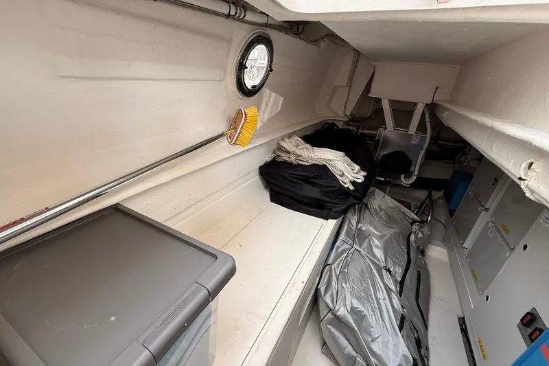 Electric Summer Yacht Photos Pics Storage area inside 2024 Greenline 48 Fly Hybrid yacht, featuring equipment and supplies.