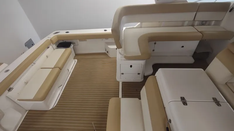  Yacht Photos Pics Interior of 2000 Tiara Yachts 3500 Open, featuring beige seating and wood flooring.