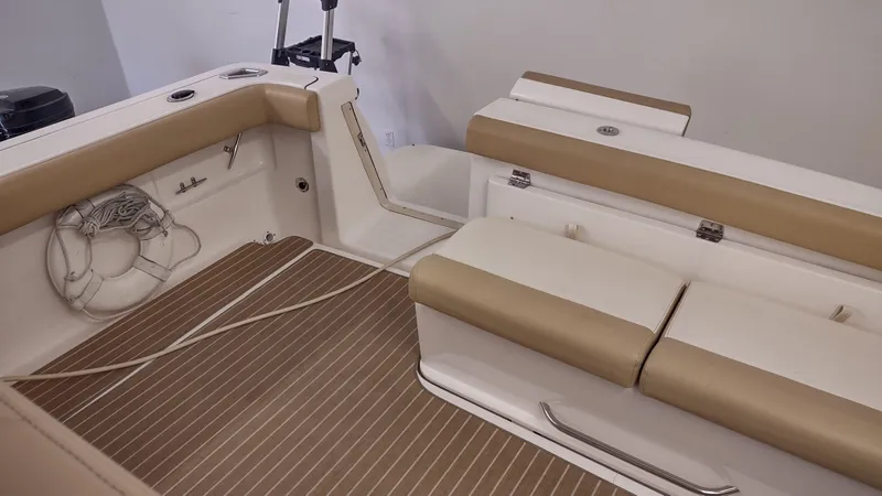  Yacht Photos Pics 2000 Tiara Yachts 3500 Open interior with beige seating and wooden flooring.