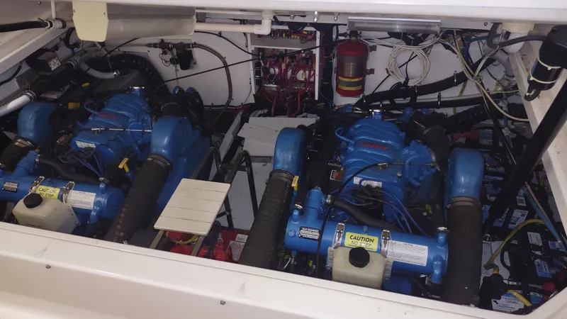  Yacht Photos Pics Engine compartment of a 2000 Tiara Yachts 3500 Open, featuring dual blue engines.