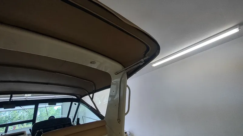  Yacht Photos Pics 2000 Tiara Yachts 3500 Open interior view with canopy and lighting.