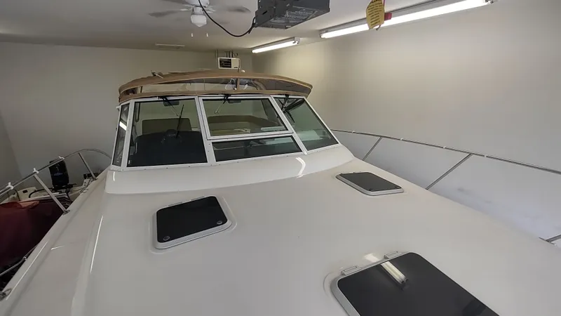  Yacht Photos Pics 2000 Tiara Yachts 3500 Open in garage, showcasing sleek design and spacious deck.