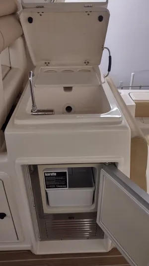  Yacht Photos Pics Tiara Yachts 3500 Open 2000 model with sink and ice maker in cabin area.