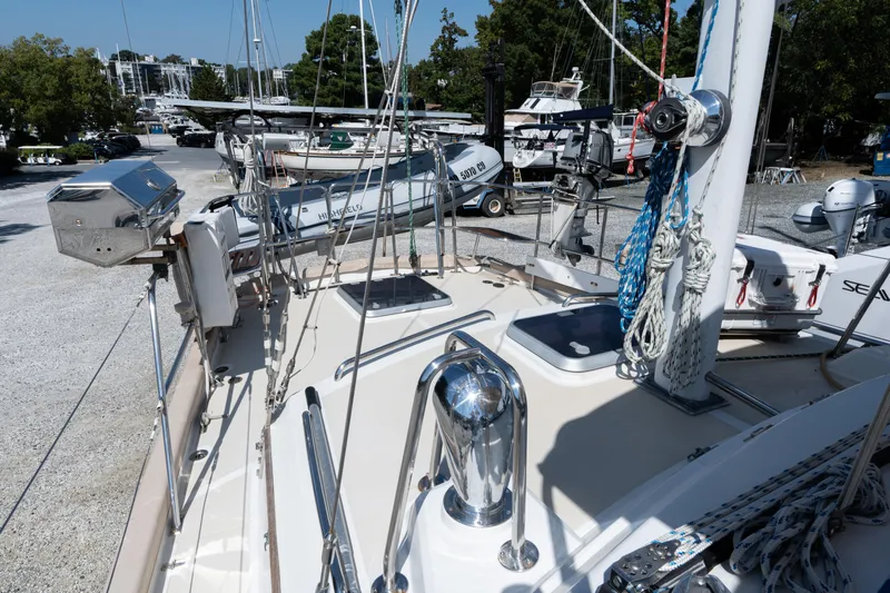 Altair Yacht Photos Pics Deck view of 2002 Passport 470 Center Cockpit Ketch, featuring rigging and equipment.