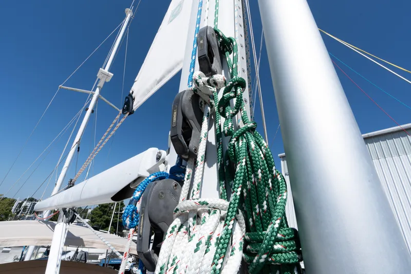 Altair Yacht Photos Pics Close-up of rigging on a 2002 Passport 470 Center Cockpit Ketch sailboat under clear blue sky.