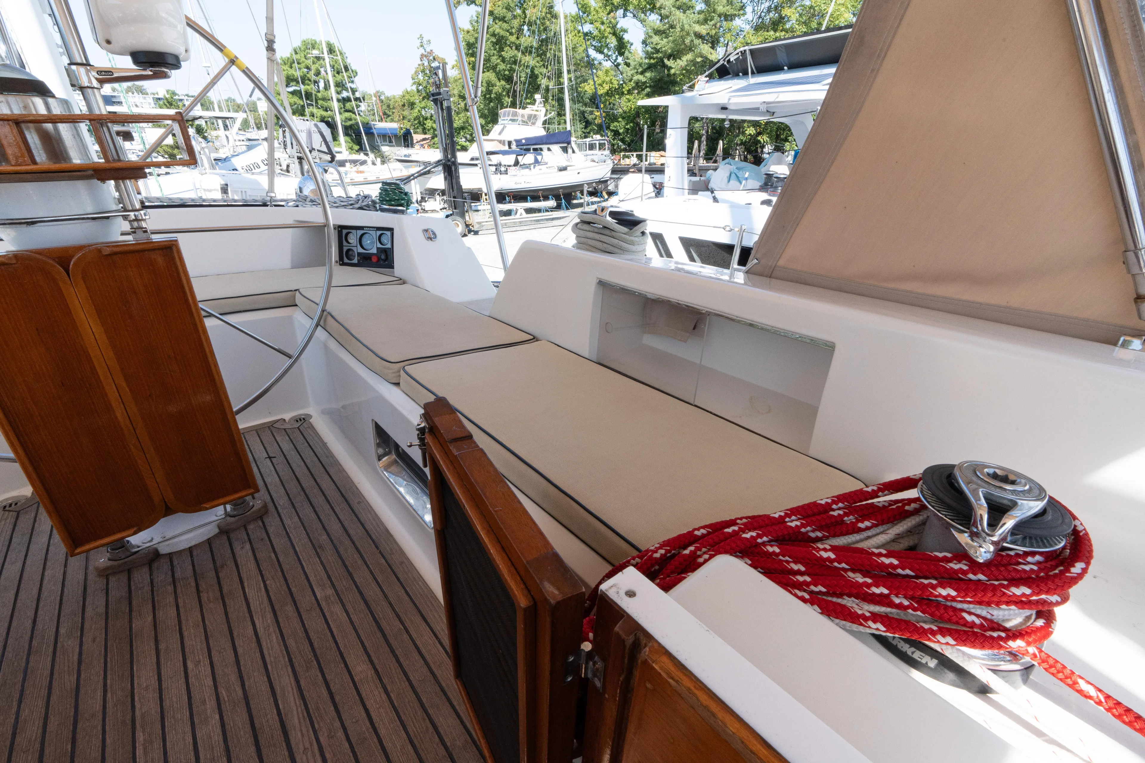 Altair Yacht Photos Pics Cockpit of 2002 Passport 470 Center Cockpit Ketch with seating and winch.