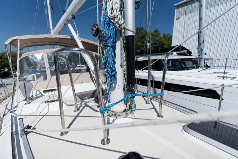 Altair Yacht Photos Pics Passport 470 Center Cockpit Ketch, 2002 model, docked with visible rigging and deck details.