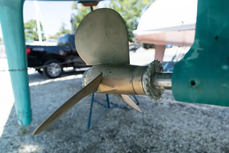 Altair Yacht Photos Pics Propeller of 2002 Passport 470 Center Cockpit Ketch in dry dock setting.