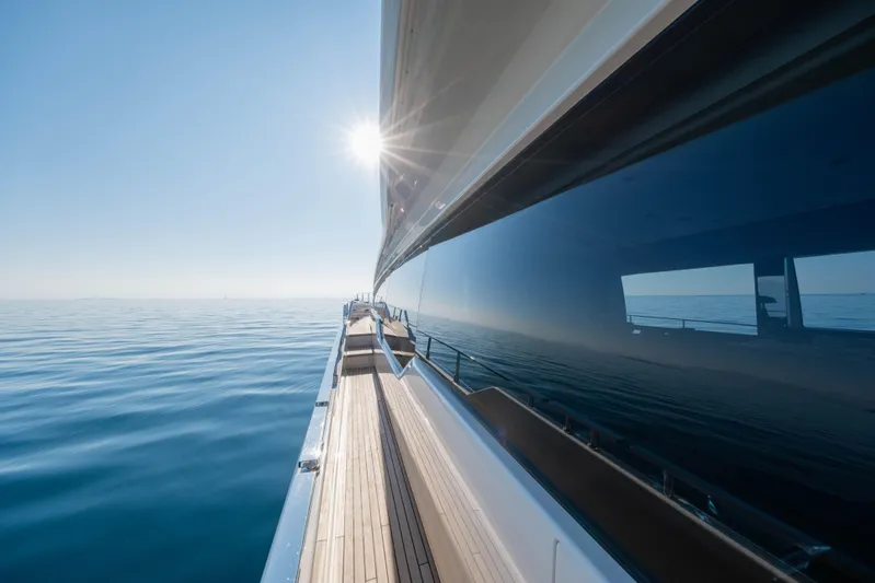 Dogu Yacht Photos Pics Ferretti Yachts 780, 2021 model, cruising on calm blue waters under a clear sky.