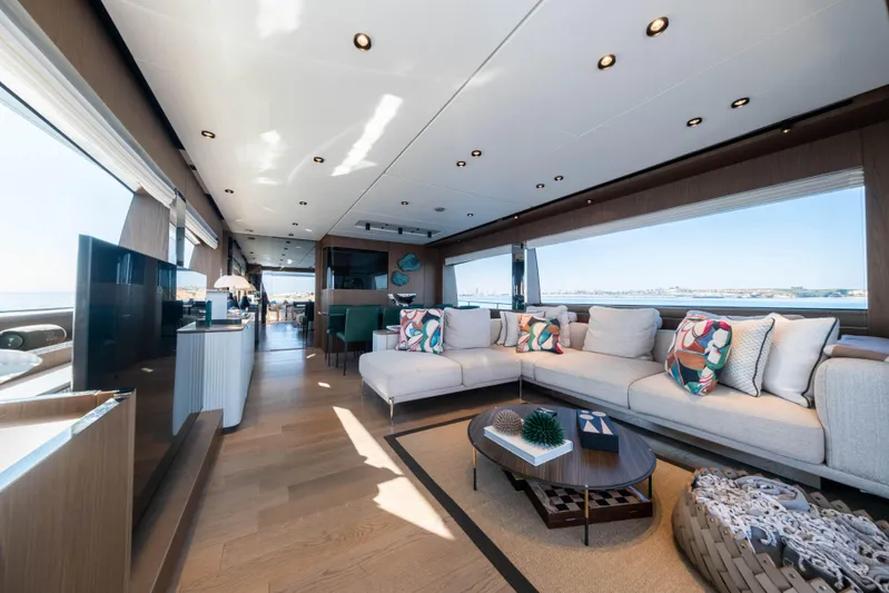 Dogu Yacht Photos Pics Luxurious interior of 2021 Ferretti Yachts 780 with modern decor and spacious seating.