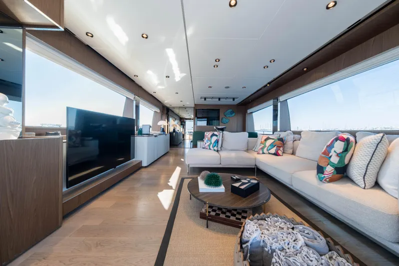 Dogu Yacht Photos Pics Luxurious interior of 2021 Ferretti Yachts 780 with modern decor and spacious seating.