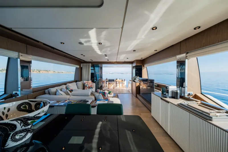 Dogu Yacht Photos Pics Luxurious interior of 2021 Ferretti Yachts 780 with panoramic ocean views.