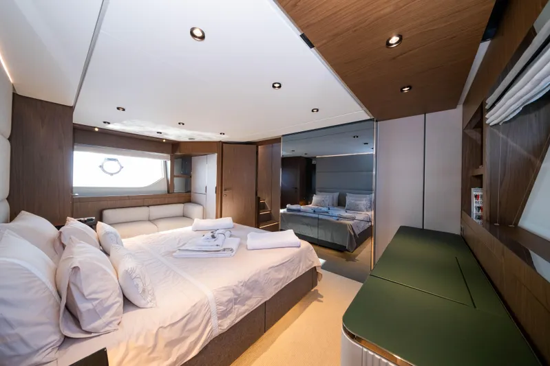 Dogu Yacht Photos Pics Luxurious bedroom interior of 2021 Ferretti Yachts 780, featuring elegant design and modern amenities.