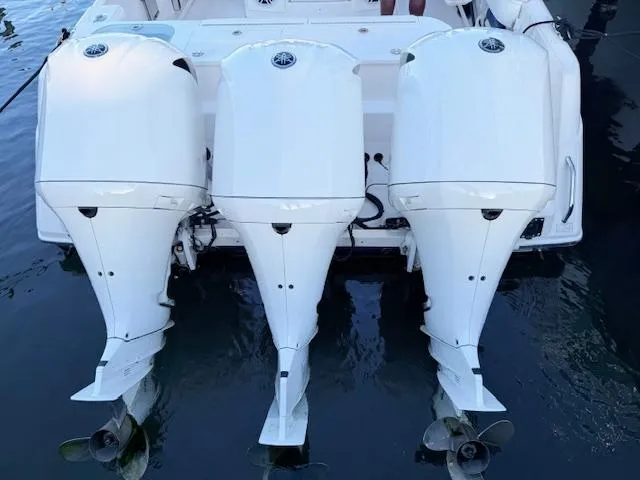  Yacht Photos Pics Triple outboard engines on a 2014 Everglades 355 Center Console boat.