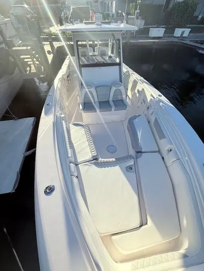  Yacht Photos Pics 2014 Everglades 355 Center Console boat with spacious seating and sleek design.