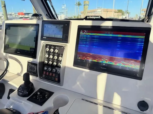  Yacht Photos Pics Control panel of 2014 Everglades 355 Center Console with navigation screens and controls.