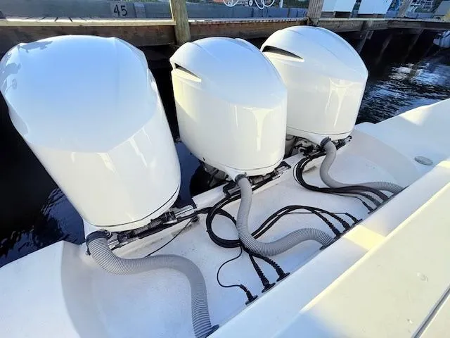  Yacht Photos Pics Triple outboard engines on a 2014 Everglades 355 Center Console boat.