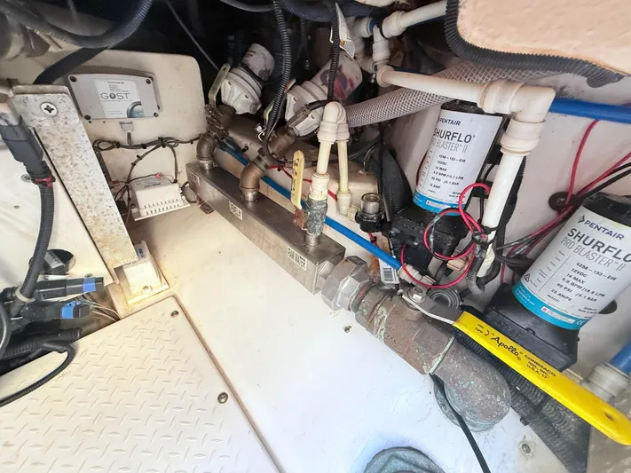  Yacht Photos Pics Engine compartment of a 2014 Everglades 355 Center Console with Shurflo components.