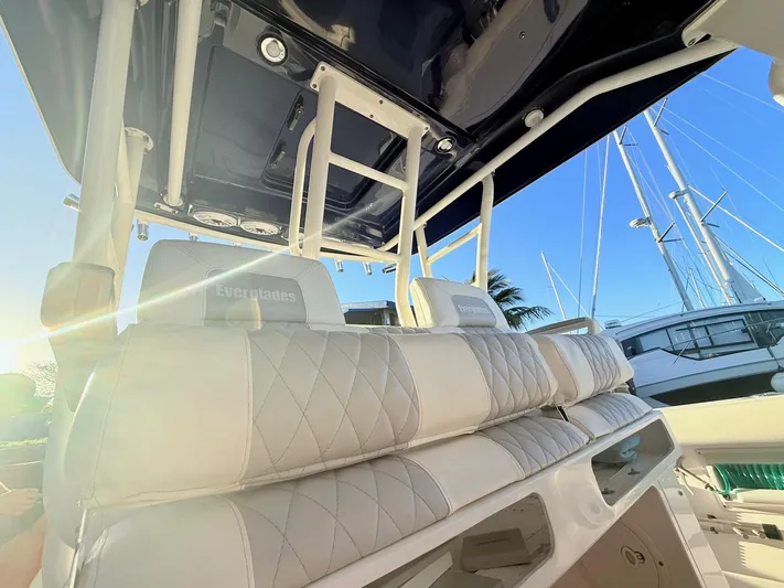  Yacht Photos Pics 2014 Everglades 355 Center Console boat interior with white seating and overhead view.