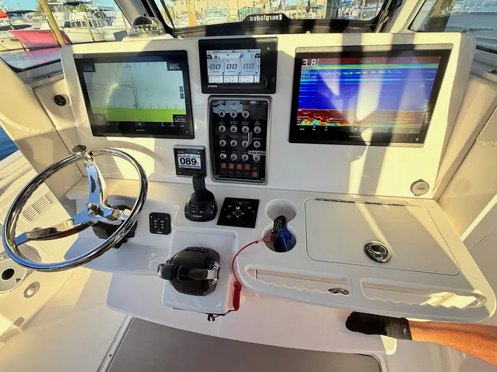  Yacht Photos Pics 2014 Everglades 355 Center Console dashboard with navigation screens and controls.