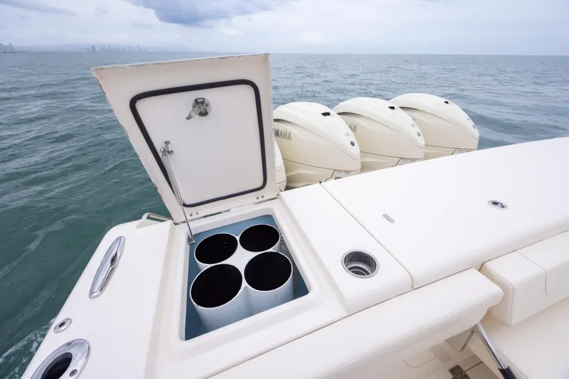  Yacht Photos Pics 2020 Grady-White Canyon 456 boat with open storage compartment and powerful engines.