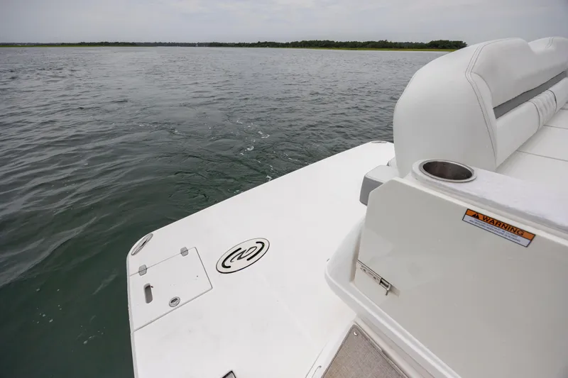  Yacht Photos Pics 2022 Regal 36 Grande Coupe boat deck overlooking calm waters.