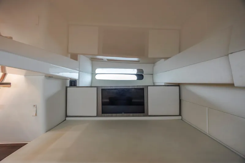  Yacht Photos Pics Interior cabin of 2022 Regal 36 Grande Coupe, featuring modern design and comfortable seating.
