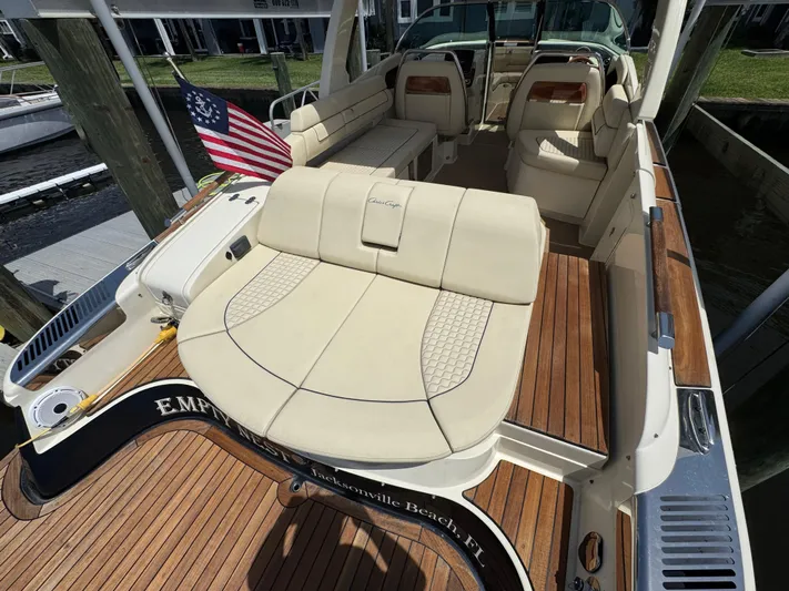  Yacht Photos Pics 2020 Chris-Craft Launch 31 GT boat with luxurious seating and wooden deck.