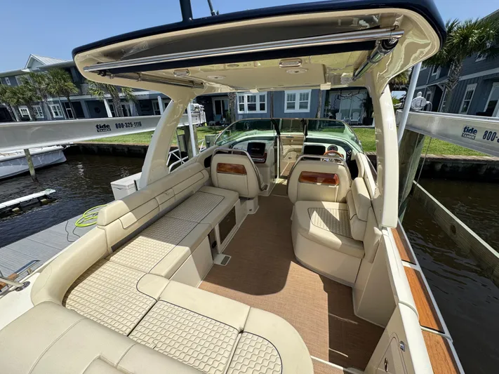  Yacht Photos Pics 2020 Chris-Craft Launch 31 GT boat interior with beige seating and elegant design.