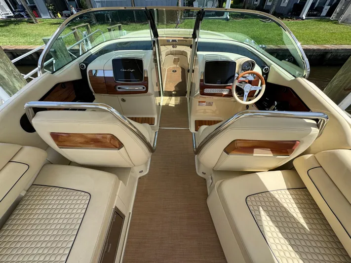  Yacht Photos Pics 2020 Chris-Craft Launch 31 GT interior with luxurious seating and elegant dashboard design.