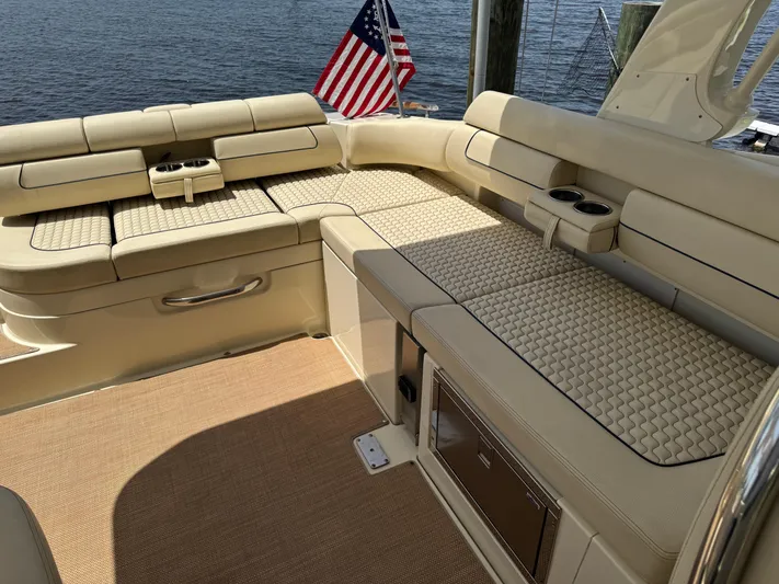  Yacht Photos Pics Luxurious seating area on 2020 Chris-Craft Launch 31 GT boat with American flag.