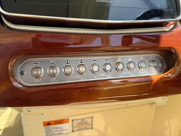  Yacht Photos Pics Dashboard controls of 2020 Chris-Craft Launch 31 GT boat with wood finish.